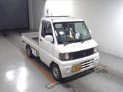 It is a picture of the white mitsubishi minicab in 2002,First Photo Stock No.Y013474