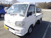 It is a picture of the white daihatsu hijet in 2000,First Photo Stock No.Y013846