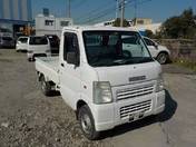 It is a picture of the white suzuki carry  truck in 2002,First Photo Stock No.Y014463
