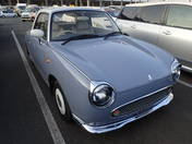 It is a picture of the blue nissan figaro open top in 1991,First Photo Stock No.Y014586