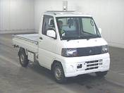 It is a picture of the white mitsubishi minicab truck in 2004,First Photo Stock No.Y014963