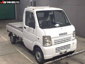 It is a picture of the white suzuki carry  in 2004,First Photo Stock No.Y015214