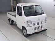 It is a picture of the white suzuki carry truck in 2010,First Photo Stock No.Y015394
