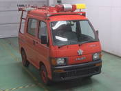 It is a picture of the red daihatsu hijet in 1997,First Photo Stock No.Y015498