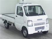 It is a picture of the white suzuki carry  truck in 2007,First Photo Stock No.Y015529