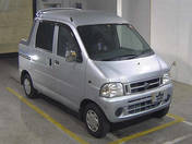 It is a picture of the silver daihatsu hijet in 1999,First Photo Stock No.Y015828