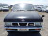 It is a picture of the black 2 nissan datsun truck in 1993,Sub Photo 1 Stock No.Y016439