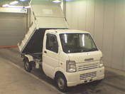 It is a picture of the white suzuki carry  dump in 2006,First Photo Stock No.Y016533