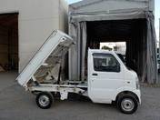 It is a picture of the white suzuki carry dump in 2013,First Photo Stock No.Y016845