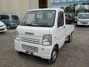 It is a picture of the white suzuki carry  truck in 2004,First Photo Stock No.Y017060