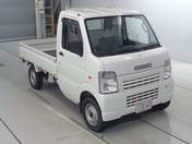 It is a picture of the white suzuki carry  truck in 2006,First Photo Stock No.Y017081