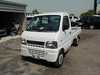 It is a picture of the white suzuki carry truck in 2002,Sub Photo 1 Stock No.Y017324