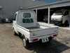 It is a picture of the white suzuki carry truck in 2002,Sub Photo 3 Stock No.Y017324