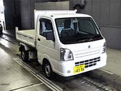 It is a picture of the white suzuki carry in 2014,First Photo Stock No.Y017507