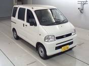 It is a picture of the white daihatsu hijet  in 2004,First Photo Stock No.Y017554