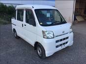 It is a picture of the white daihatsu hijet deck van in 2005,First Photo Stock No.Y017985