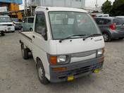 It is a picture of the white daihatsu hijet  truck in 1996,First Photo Stock No.Y018193