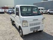 It is a picture of the white suzuki carry truck in 2003,First Photo Stock No.Y018267