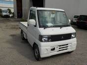It is a picture of the white mitsubishi minicab truck in 2002,First Photo Stock No.Y018504