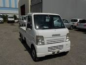 It is a picture of the white suzuki carry truck in 2007,First Photo Stock No.Y018682