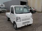 It is a picture of the white suzuki carry truck in 2011,First Photo Stock No.Y019107