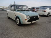 It is a picture of the light blue nissan pao in 1990,First Photo Stock No.Y019409