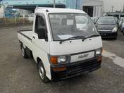It is a picture of the white daihatsu hijet truck in 1994,First Photo Stock No.Y019845