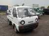 It is a picture of the white suzuki carry truck in 1992,Sub Photo 0 Stock No.Y019907