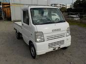 It is a picture of the white suzuki carry truck in 2002,First Photo Stock No.Y020122