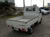 It is a picture of the white suzuki carry truck in 2002,Sub Photo 2 Stock No.Y020122