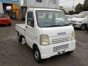 It is a picture of the white suzuki carry truck in 2002,First Photo Stock No.Y020365