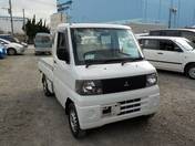 It is a picture of the white mitsubishi minicab truck in 2001,First Photo Stock No.Y020536