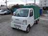 It is a picture of the white suzuki carry truck in 2003,Sub Photo 0 Stock No.Y020766