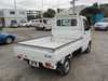 It is a picture of the white suzuki carry truck in 2005,Sub Photo 2 Stock No.Y020832