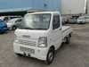 It is a picture of the white suzuki carry truck in 2005,Sub Photo 1 Stock No.Y020832