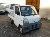 It is a picture of the white mitsubishi minicab truck in 1999,First Photo Stock No.Y020921