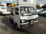 It is a picture of the white suzuki carry truck in 1990,First Photo Stock No.Y020933