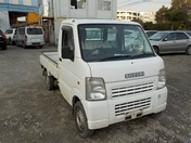 It is a picture of the white suzuki carry truck in 2007,First Photo Stock No.Y021016