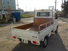 It is a picture of the white suzuki carry truck in 2004,Sub Photo 2 Stock No.Y021030