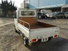 It is a picture of the white suzuki carry truck in 2004,Sub Photo 3 Stock No.Y021030