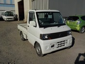 It is a picture of the white mitsubishi minicab  truck in 2002,First Photo Stock No.Y021079