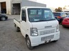 It is a picture of the white suzuki carry truck in 2004,Sub Photo 0 Stock No.Y021188