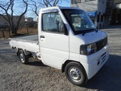 It is a picture of the white mitsubishi minicab truck in 2001,First Photo Stock No.Y021258