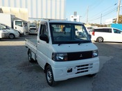 It is a picture of the white mitsubishi minicab truck in 2006,First Photo Stock No.Y021340