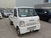It is a picture of the white suzuki carry truck in 2003,Sub Photo 1 Stock No.Y021341