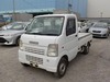 It is a picture of the white suzuki carry truck in 2003,Sub Photo 0 Stock No.Y021341