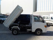 It is a picture of the white daihatsu hijet  dump in 1994,First Photo Stock No.Y021437
