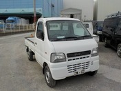 It is a picture of the white suzuki carry truck in 2001,First Photo Stock No.Y021505