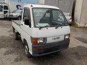 It is a picture of the white daihatsu hijet  truck in 1997,First Photo Stock No.Y021566