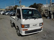 It is a picture of the white daihatsu hijet  truck in 1998,First Photo Stock No.Y021609